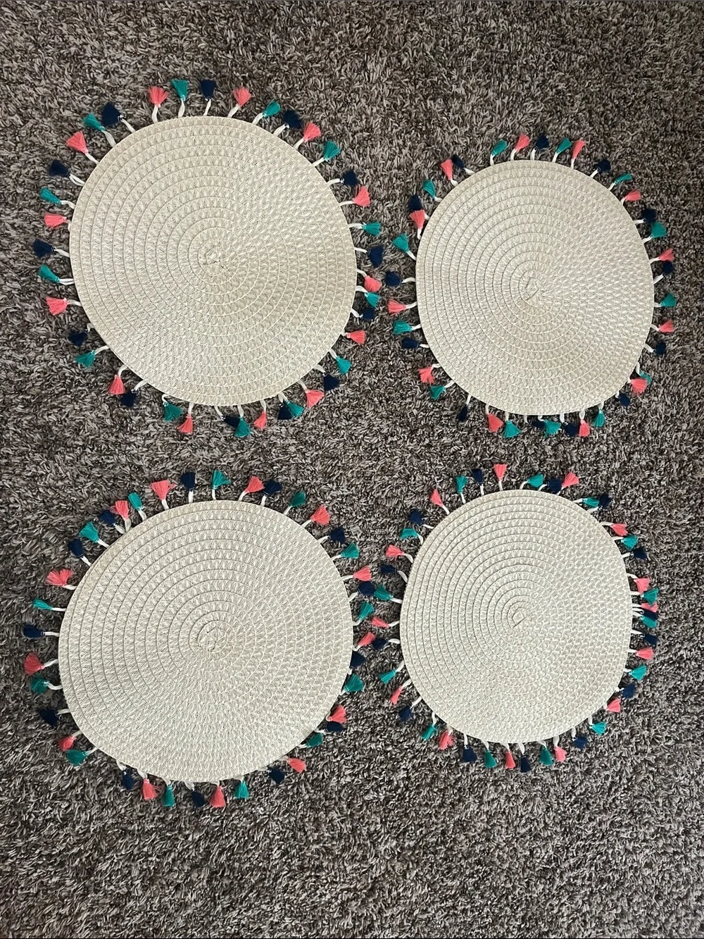 Like New- Woven Round Placemats with Pink, Teal, and Navy Tassels - Set of 4